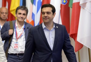 Greek Prime Minister Alexis Tsipras (R) and Finance Minister Euclide Tsakalotos leave at the end of an Eurozone Summit over the Greek debt crisis in Brussels on July 13, 2015. Juncker said there was no longer any risk of Greece crashing out of the euro after Athens agreed a bailout deal with eurozone partners. AFP PHOTO / THIERRY CHARLIERTHIERRY CHARLIER/AFP/Getty Images