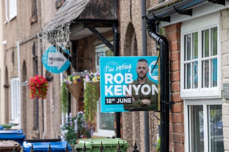 Reform byelection campaign placards attached to two terrace houses