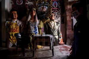 Traditional giant dolls are kept in the house of a craftsman in Olinda, Brazil, 13 February 2021. The centennial carnival parade of the giant dolls in Olinda was suspended this year.