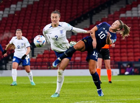 England's Lucy Bronze and Scotland's Kirsty Hanson battle for the ball.