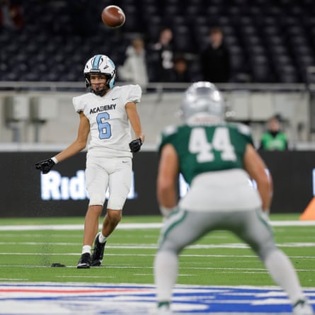 NFL Academy player Rafael Varona-Blakstad from London chips a kick off during the match against De La Salle Spartans.