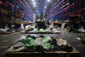 Migrants in warehouse