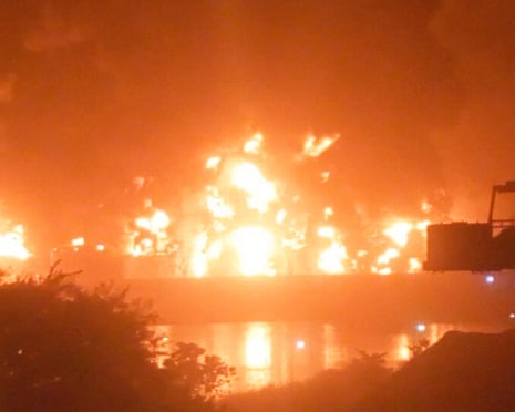 An explosion at the main oil terminal in Guinea's capital has killed at least eight people and wounded dozens