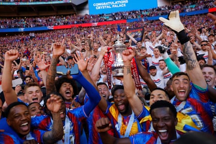 Crystal Palace players and fans celebrate winning the FA Cup final at Wembley.