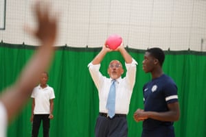 London, UK. The chancellor, Nadhim Zahawi, plays volleyball during a visit to a holiday activities and food club