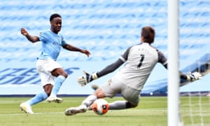 Manchester City’s Raheem Sterling scores the third goal past Norwich City’s goalkeeper Tim Krul.