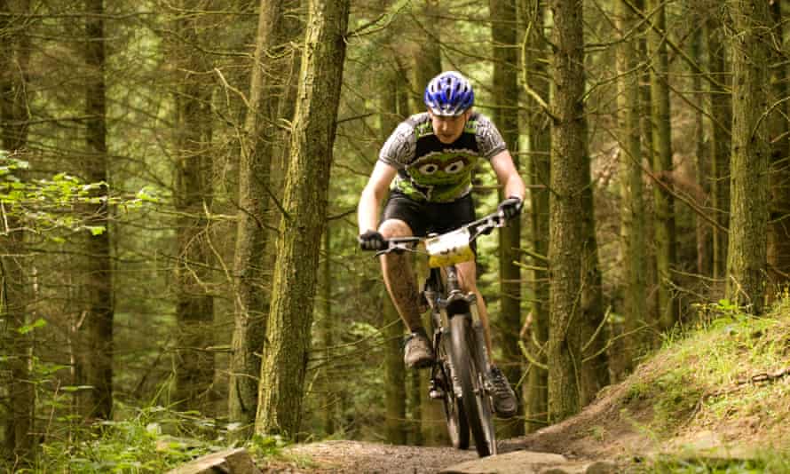 Mountain biker on the 7 Stanes forest trail in Dumfries.
