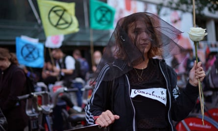 An Extinction Rebellion protester on The Strand in London.
