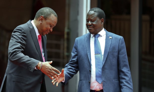 President Uhuru Kenyatta, left, shakes hands with the opposition leader Raila Odinga after announcing an agreement to work together in 2018.
