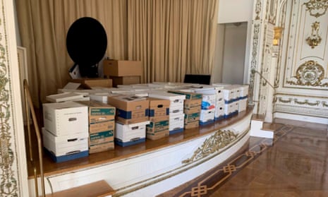 This image, contained in the indictment against former President Donald Trump, shows boxes of records being stored on the stage in the White and Gold Ballroom at Trump's Mar-a-Lago estate in Palm Beach, Fla. Trump is facing 37 felony charges related to the mishandling of classified documents according to an indictment unsealed Friday, June 9, 2023. (Justice Department via AP)