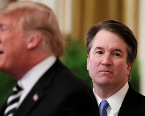 FILE PHOTO: U.S. President Donald Trump speaks next to U.S. Supreme Court Associate Justice Brett Kavanaugh as they participate in a ceremonial public swearing-in in the East Room of the White House in Washington, U.S., October 8, 2018. REUTERS/Jim Bourg/File Photo