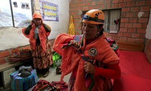 The women prepare for the climb at Huayna Potosí mountain refuge in Bolivia