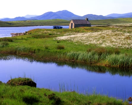 Water, hills and a lonely hut in Scotland