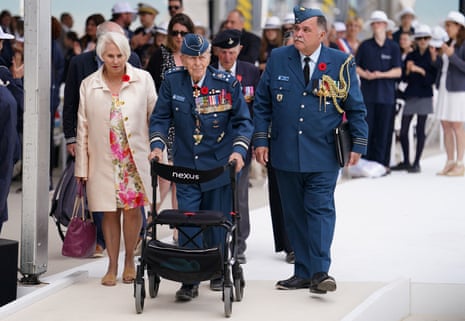 Canada's most decorated military veteran, 100-year-old Maj Gen Richard Rohmer (C) attends the international commemorative ceremony at Omaha beach, Saint Laurent sur Mer, Normandy.