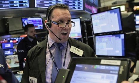 Trader Edward Curran works on the floor of the New York Stock Exchange today.