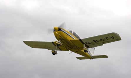 A Piper Cherokee light aeroplane taking off from Breighton airfield, in West Yorkshire