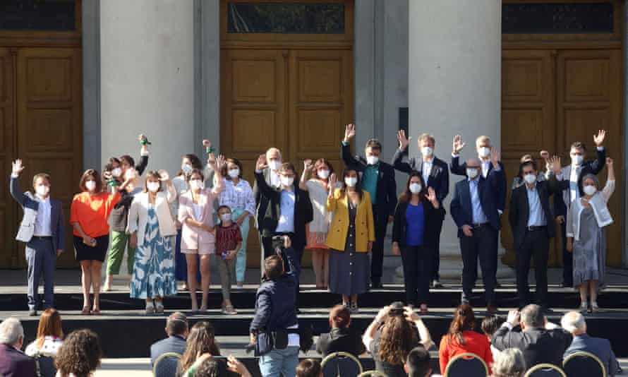 The Chilean president-elect, Gabriel Boric (centre in blue shirt), presents his first cabinet in Santiago, Chile.