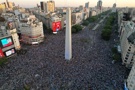 In this aerial view, fans of Argentina celebrate their team's victory at the Obelisk in Buenos Aires.