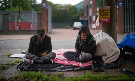 Afghan refugees on hunger strike outside the Home Office in Glasgow last August