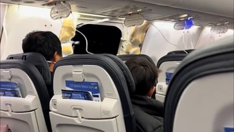 Alaska Airlines plane makes emergency landing after window blows out mid-air – video