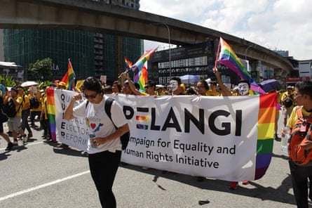 LGBT rights group the Pelangi group marches in Kuala Lumpur.