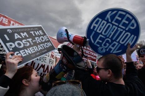 Anti-abortion and pro-choice demonstrators protest outside of the supreme court on 20 January 2023.
