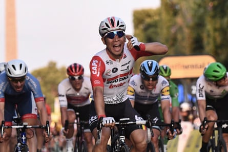 Australia’s Caleb Ewan celebrates winning the final stage after coming from nowhere.