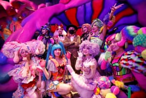 Tokyo, Japan: staff members of Kawaii Monster Cafe known as ‘Monster Girls’ pose with Sebastian Masuda, an artist who designed the cafe, as it ends its five-year run