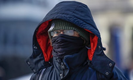 A man braves the freezing weather in Chicago, Illinois Thursday.
