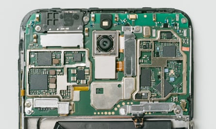 Top view of the circuitry and internal board of a mobile phone.