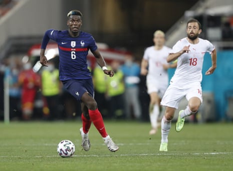 France’s Paul Pogba, left, on the ball.