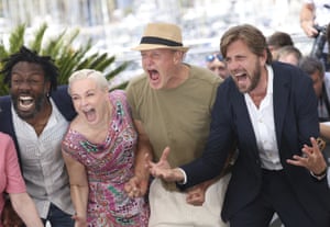 Jean-Christophe Folly, Vicki Berlin, Woody Harrelson and Ruben Östlund at a photocall for the film Triangle of Sadness at Cannes film festival in France