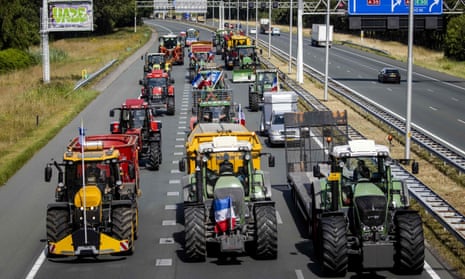 Dutch farmers stage a go-slow protest against government plans to cut nitrogen emissions
