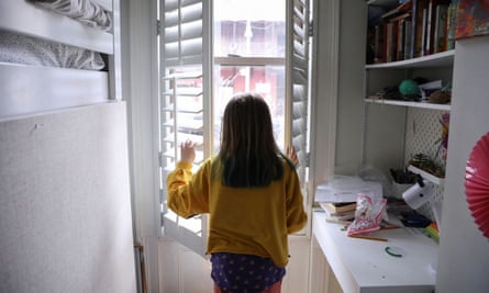 Lydia Hassebroek looks out at the view from her window in Brooklyn, New York.