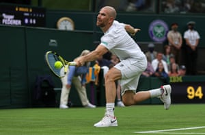 Adrian Mannarino stretches for a return.