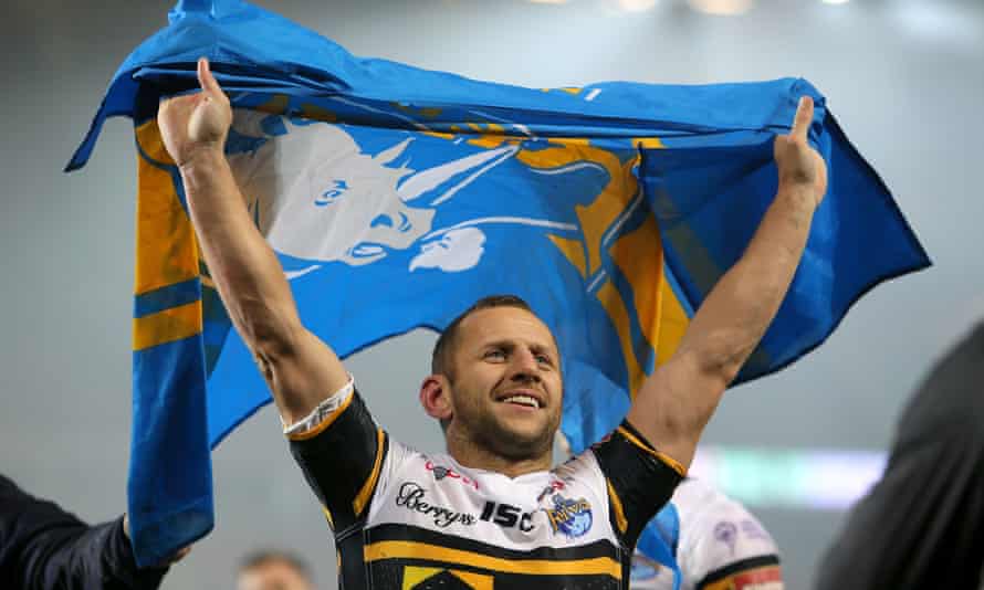 Rob Burrow celebrates his eighth Grand Final victory in his last game for Leeds in 2017.