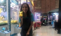 Farz Edraki with the spoils of her claw machine victory.