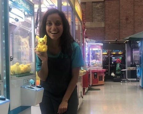 Farz Edraki with the spoils of her claw machine victory.