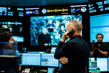 Hanks talking on the phone to astronauts at Nasa’s Johnson Space Center in Houston, Texas, from the documentary Moonwalkers 