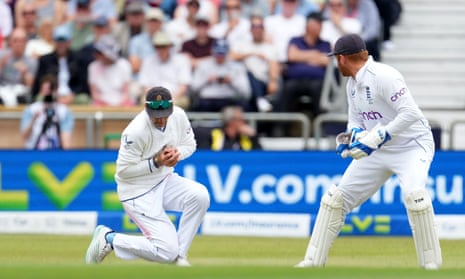 England's Joe Root (left) takes a catch to dismiss Australia's Marnus Labuschagne during day one of the third Ashes test match at Headingley.