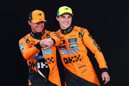 Lando Norris and Oscar Piastri laughing together.