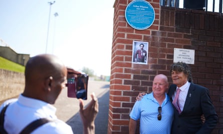 Ken Monkou takes a photo of David Speedie and Shaun Campbell at the unveiling 