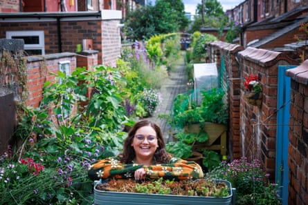 Yasmine El-Gabry in her plant-covered alleyway.