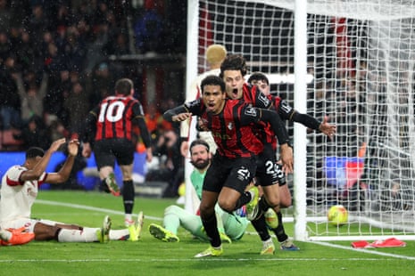 Amine Adli (front) celebrates scoring Bournemouth’s late winner.
