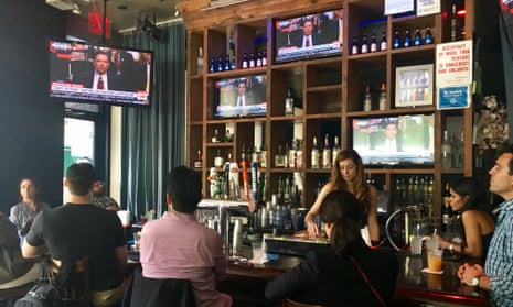Customers in sideBar in New York City watch James Comey’s testimony to Congress.