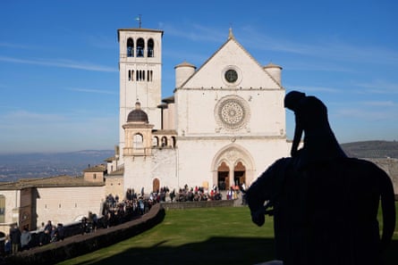 Pilgrims leave the basilica after visiting the bones of Saint Francis