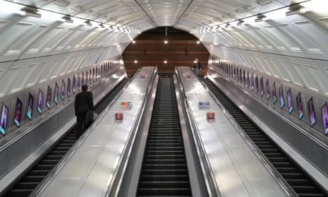 Near-empty escalators at Liverpool Street tube station in London during strike action by tube staff on Friday.