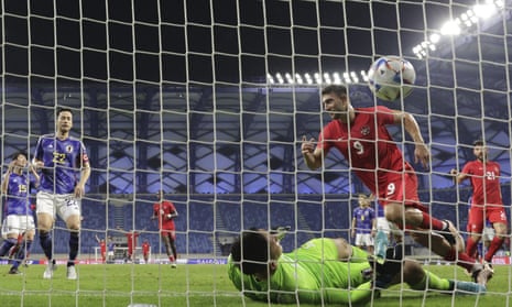 Canada's Lucas Cavallini celebrates after he scored from a penalty kick against Japan.