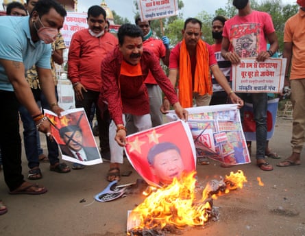 Activists stage a protest against China in Bhopal, India, on Tuesday. Public opinion may make calming tensions difficult.