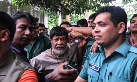Photojournalist Shahidul Alam arrives for an appearance in court after his arrest on Sunday.